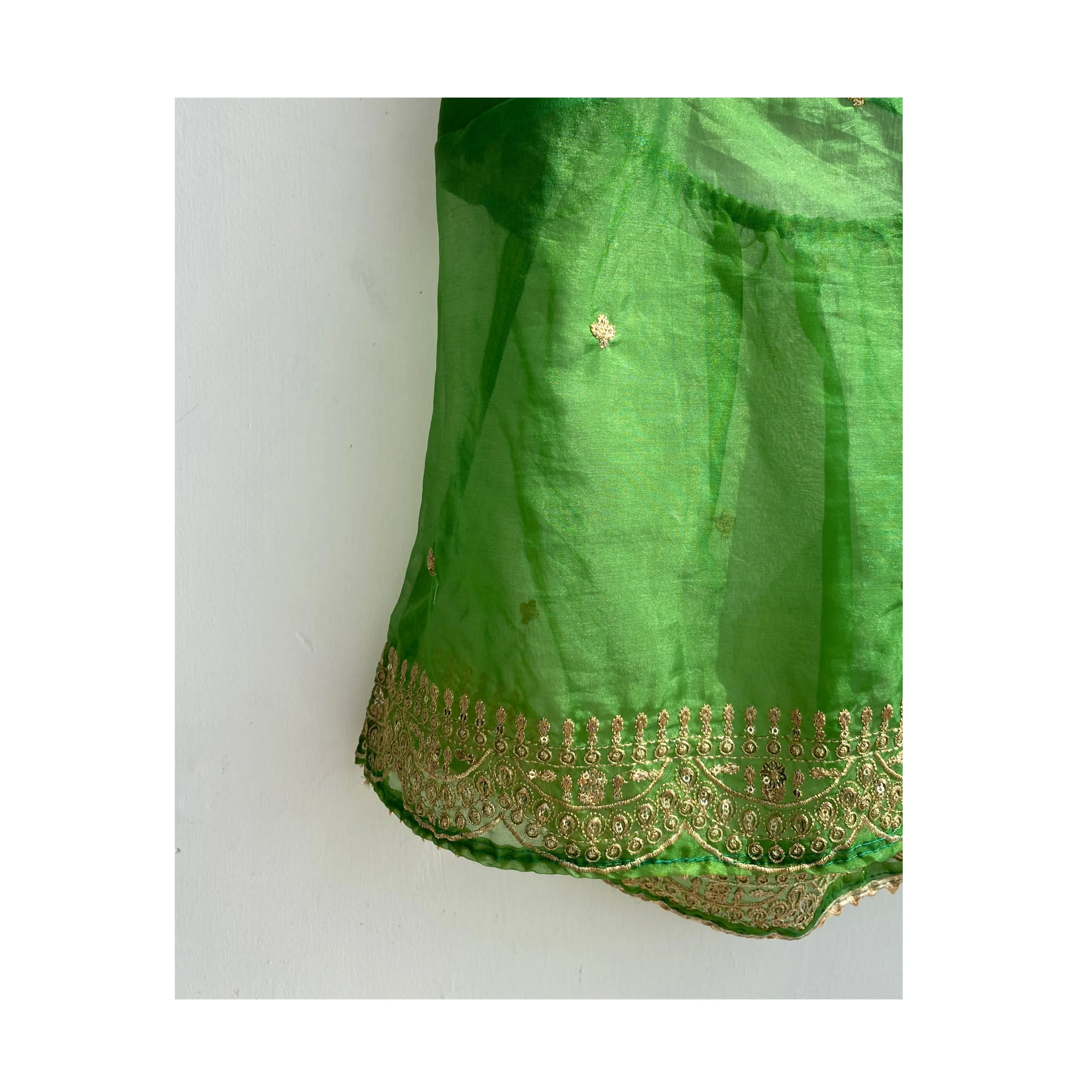 Green with golden embroidery